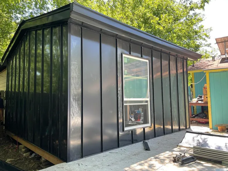 Black standing seam metal wall panels for Roof Inspection in Savannah